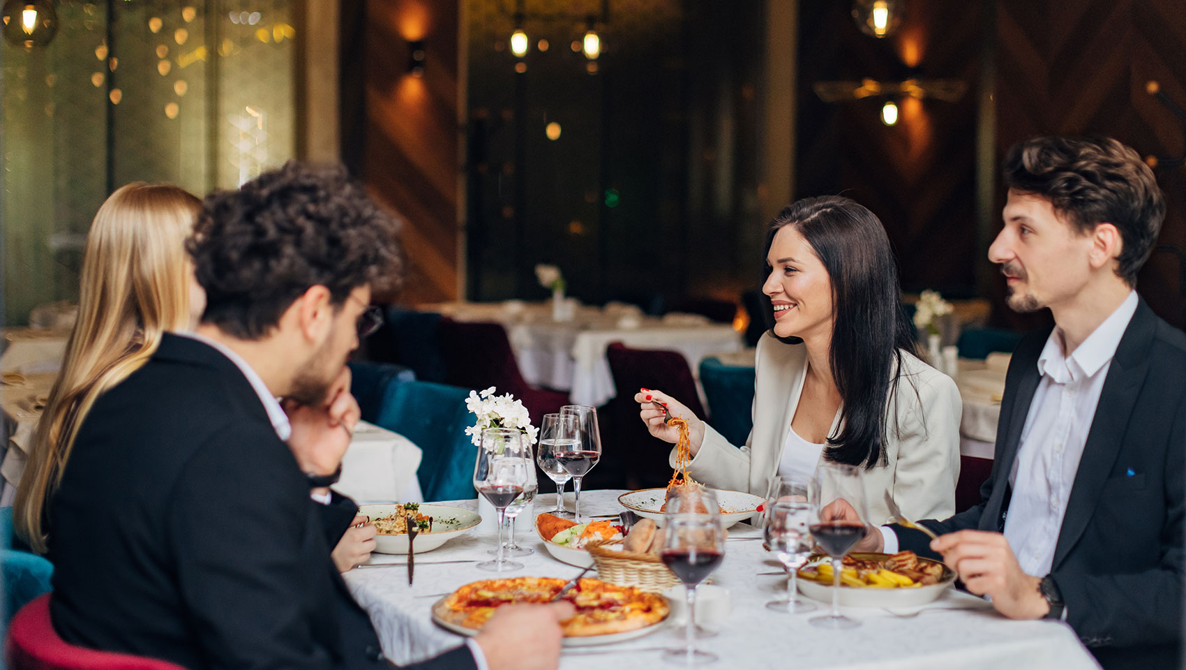 group of business partners having dinner